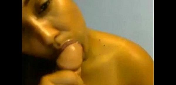  Ebony babe sucks dildo on webcam